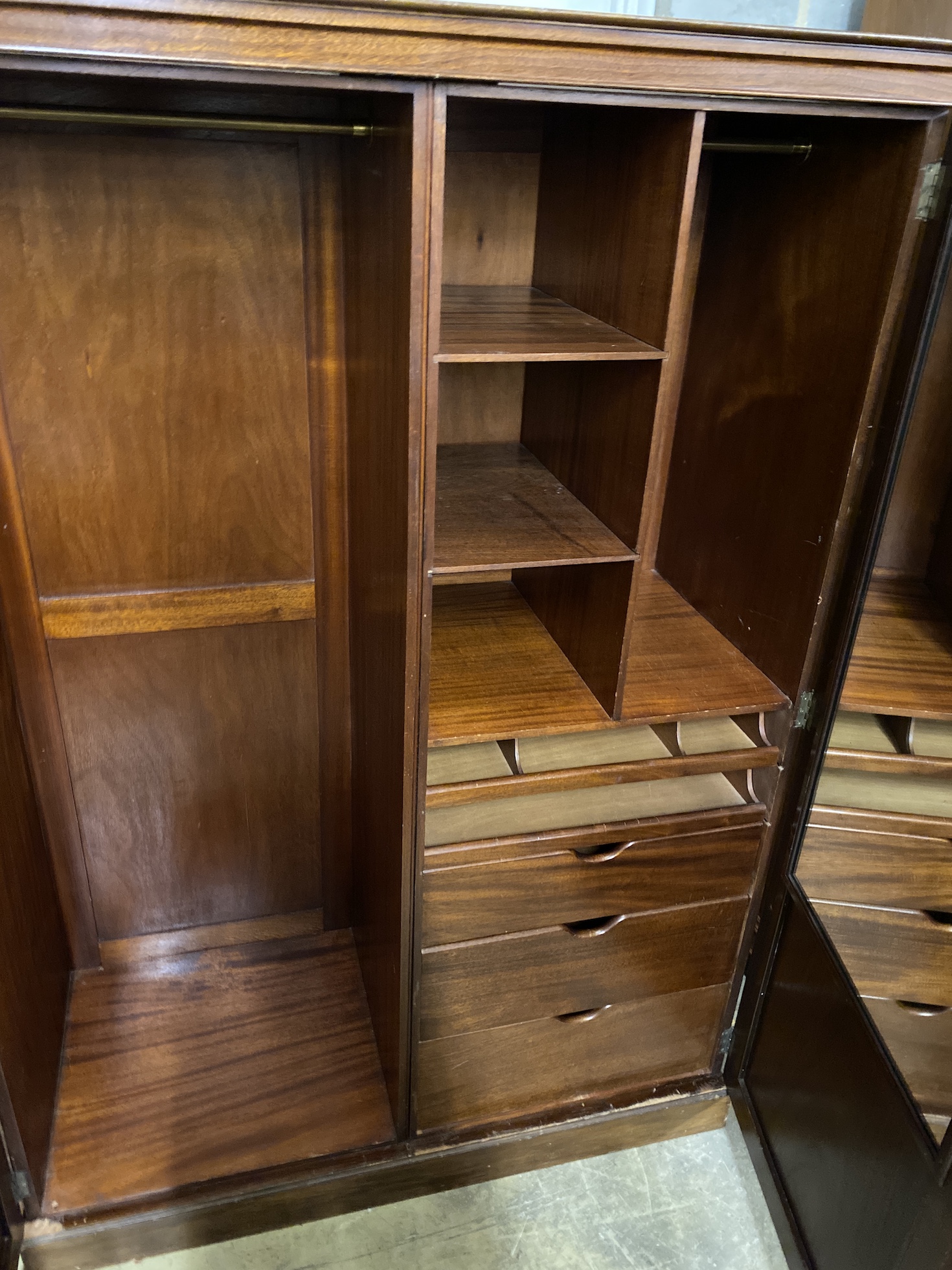 An early 20th century Heal & Son mahogany compactum wardrobe, width 127cm, depth 56cm, height 179cm